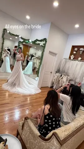 A post by @bridalinfluencerkasia on TikTok caption: All eyes are on the bride. Meaning we’re also paying attention to how she reacts to each dress as she’s trying it on; without us overloading her too much with our own feedback. This is so that she could focus on herself, her thoughts, her feelings - picturing herself on the day that she will be wearing this gown, while committing herself to the love of her life, on quite possibly the most photographed day of her life. That is how we can fully support our brides, because this very personal decision is fully the bride’s; We should feel honored to be there to witness her make this special choice ❤️🥂 #bridesstyle #bridetobe #bride #chicagobride #bridalinfluencer #dramatok #weddingdress #bridalgown #weddinggownshopping #weddingdressshopping #yestothedress  #chicago #bridaltiktok #bridaltok #weddingtiktok #weddingtok #weddinggowns #nodrama #motherofthebride #motherofthegroom #dressshopping #bridesmaids #bridalinfluencerkasia #kasiasbridalbride #kasiasbridalchicago #kasiasbridal 