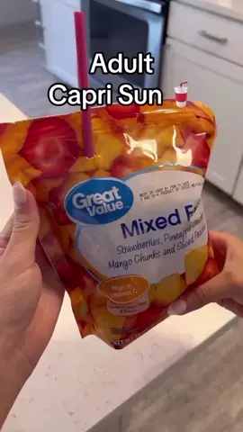 A post by @cocktails on TikTok caption: Splash into summer with these Adult Capri Suns ☀️ Only three ingredients needed. -bag of frozen fruit -vodka -lemonade #adultcaprisun #caprisun #vodka #lemonade #fruit #summer