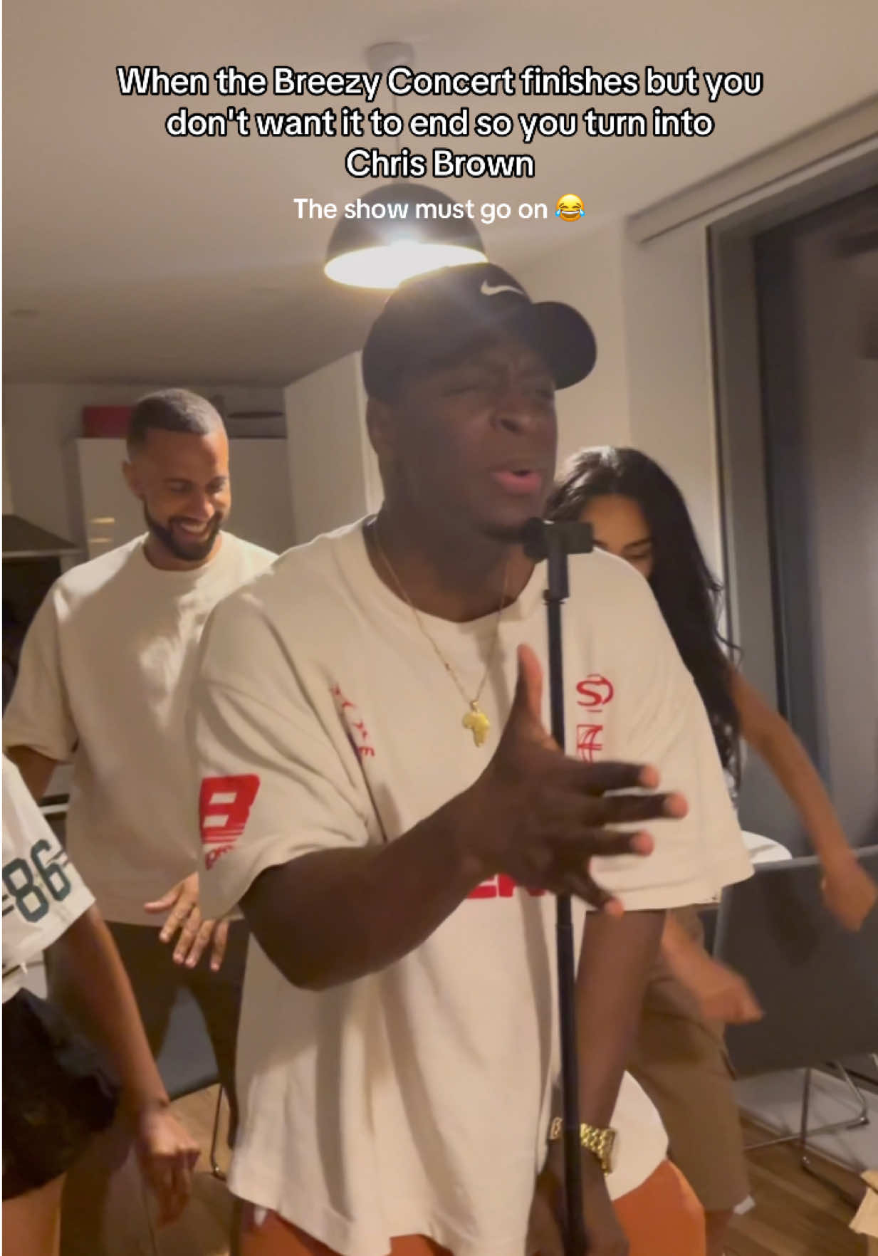 A post by @juliusburphy on TikTok caption: She asked me what would you do if Chris brown asked me to go on stage I told her you got Chris Brown at home😂 shout out to my backing singers and dancers @Ru @Keshia Jayne @Kennyo_e 🎥 @chrisbrownofficial #breezybowl #chrisbrown #saygoodbye 