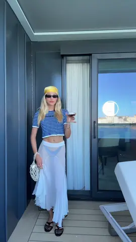 A post by @alixearle on TikTok caption: Sicily draft ootd (needing a sip marg)