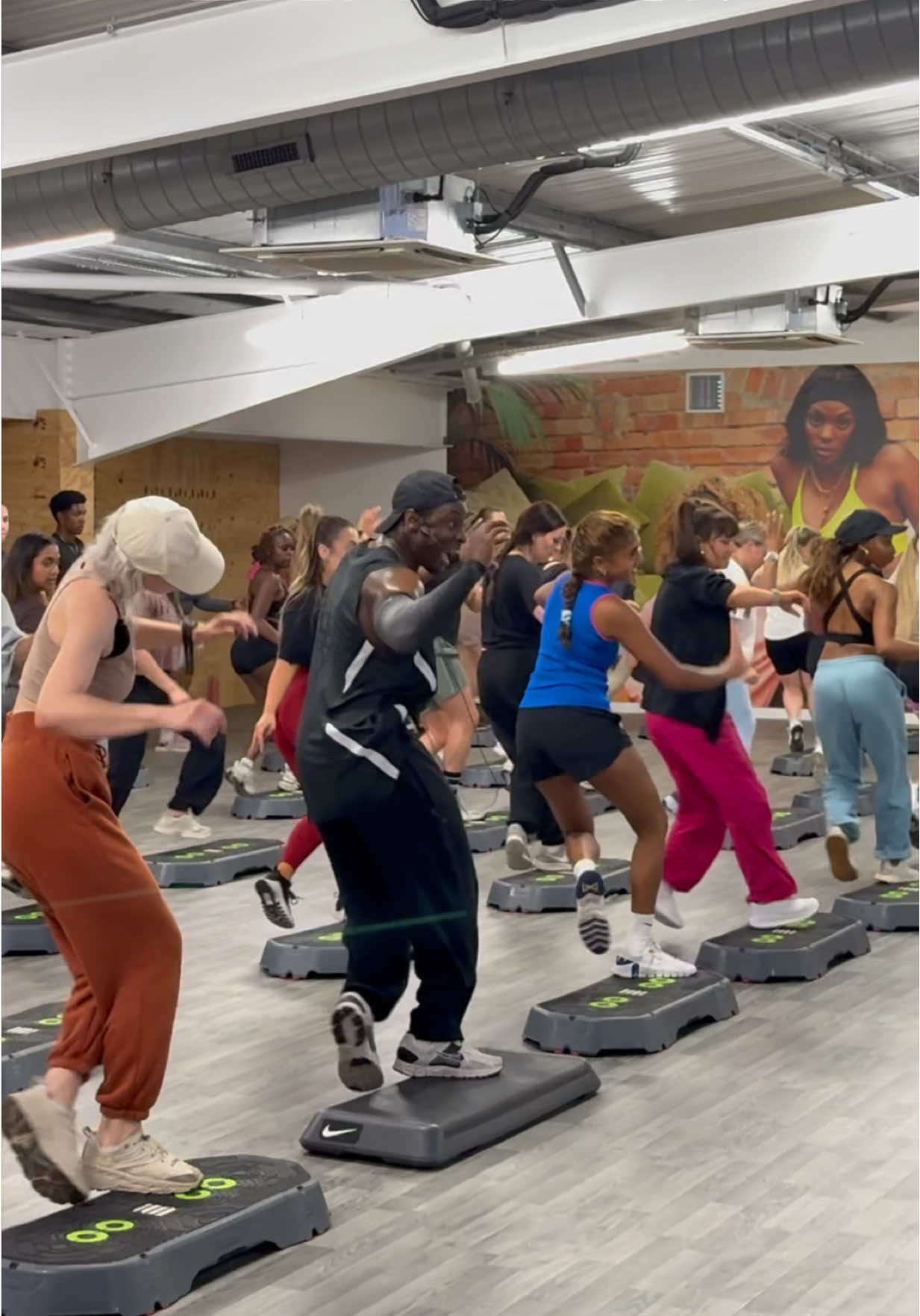 A post by @juliusburphy on TikTok caption: High Energy High Vibes 🔥🔥 insane class @Missy Elliott #fyp #foryoupage #stepperton #juliusburphy #hiphopstepaerobics #afrostep #funcardio #nike #missyelliott #losecontrol 