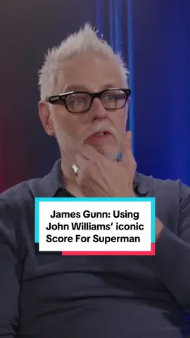 A post by @geekculture on TikTok caption: James Gunn showed John Williams how his iconic Superman theme would be used for #Superman and the rest is cinematic music history! Watch the full interview via the article link. #JamesGunn #JohnWilliams #WhatToWatch #Interview #LookUp #LookUpManila #Geek