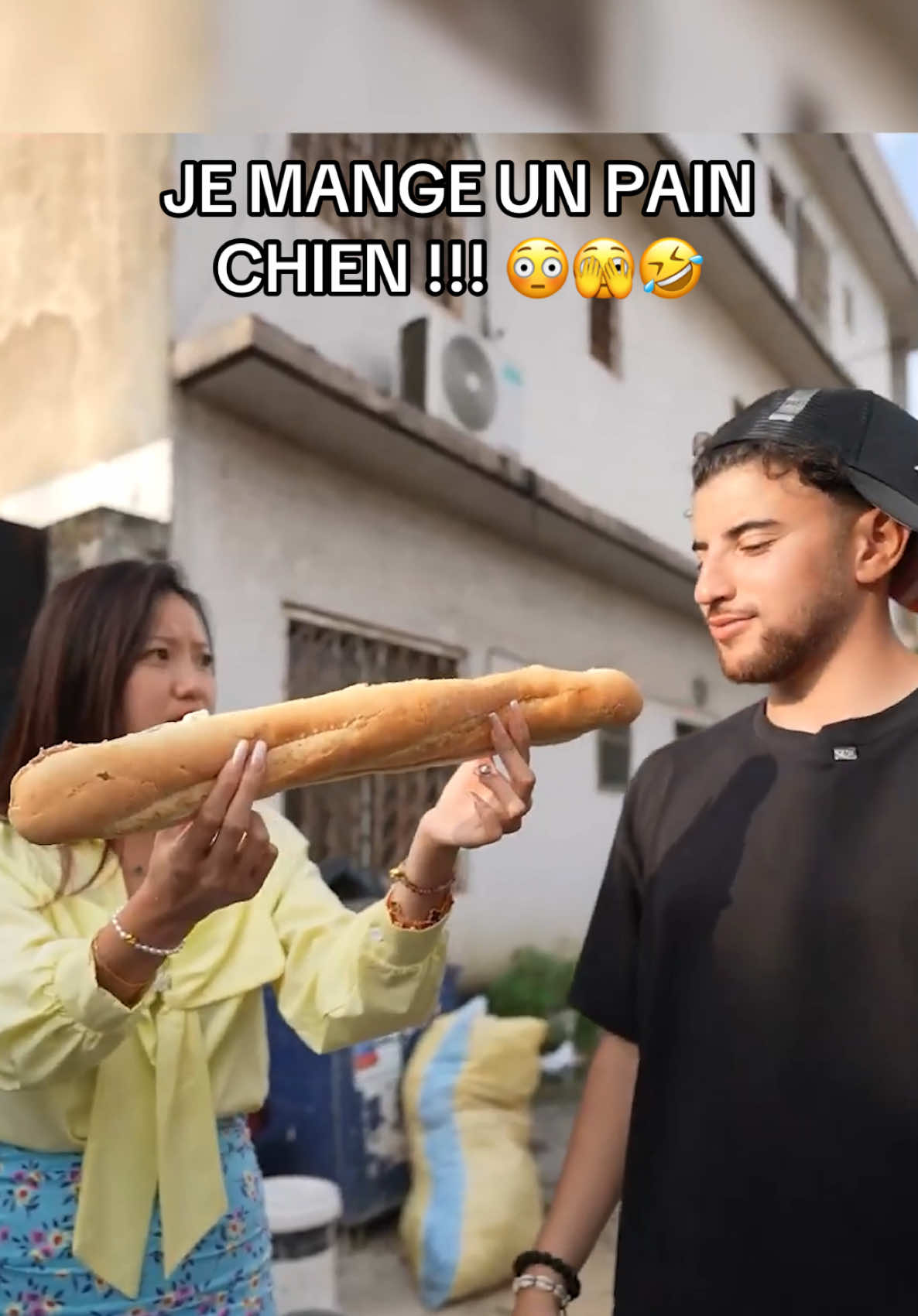 A post by @riadhlevrai on TikTok caption: Vous connaissez le pain chien  ? 🤣🤣🤣 Vlog complet de mon voyage en Côte d’Ivoire dispo sur YouTube 🇨🇮🔥