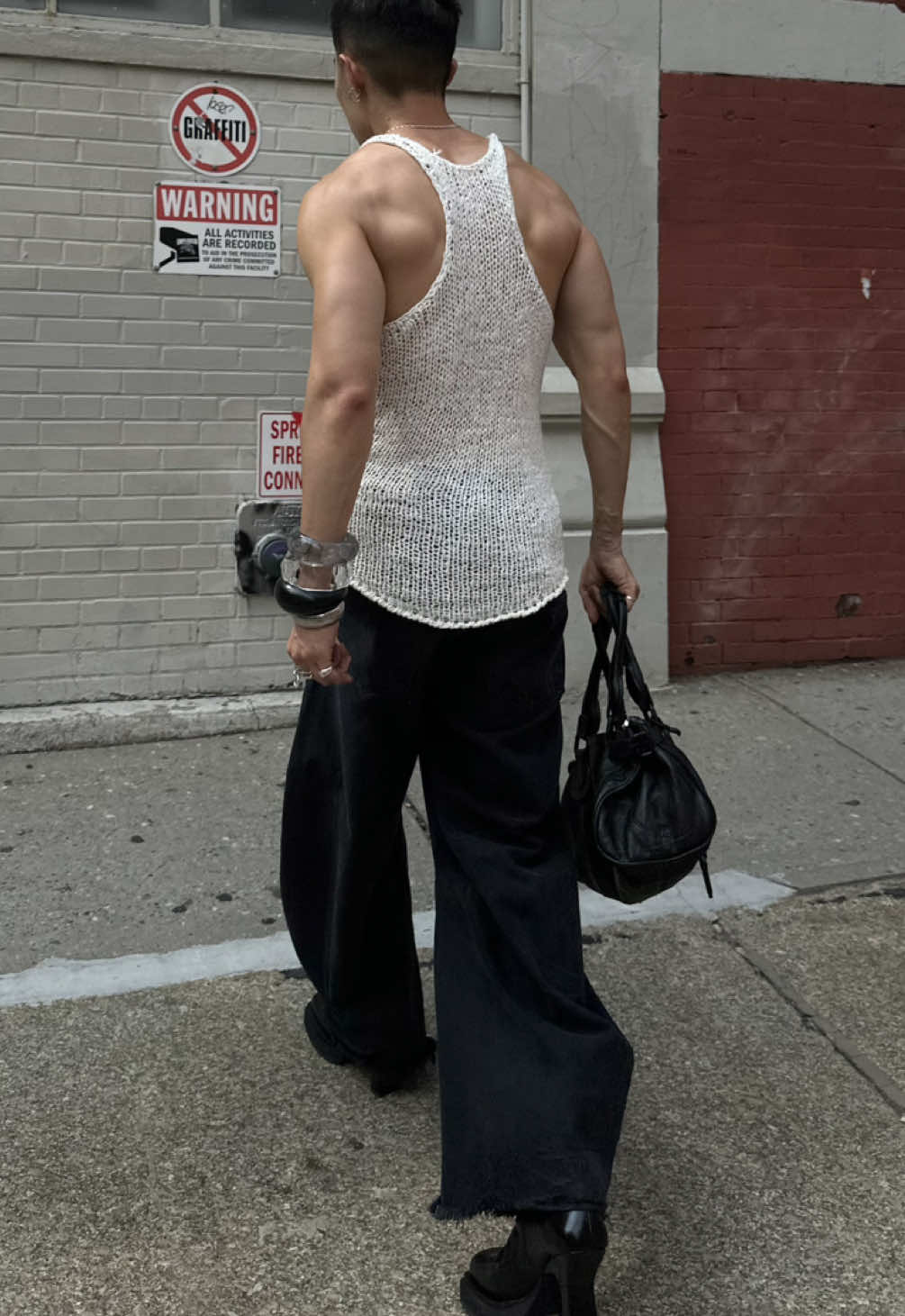 A post by @theedwardpark on TikTok caption: My elevated tank top collection 🖤 a perfect roundup for the summer. (ft. @SAINT LAURENT, @The Peter Do, Rick Owens, etc.) #tanktop #tanktops #tanktopstyle #mensfashion #summerfashion 