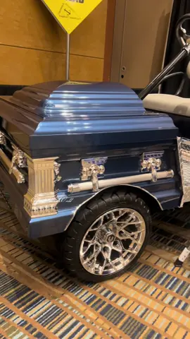 A post by @officialfuneralworld on TikTok caption: #drivingacasket #officialfuneralwolrd #ofwmediateam #trianglecasketcompany #fypシ #scma100 