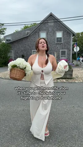 A post by @noelledowning on TikTok caption: You know sometimes those check in notifications can really take you out of the vacation 😭 