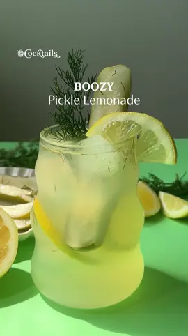 A post by @cocktails on TikTok caption: This Boozy Pickle Lemonade is the unexpected summer sip you didn’t know you needed. 🥒🍋 -6 oz. lemonade -3 oz. pickle brine -2 oz. vodka #picklelemonade #pickle #lemonade #boozylemonade #picklecocktail