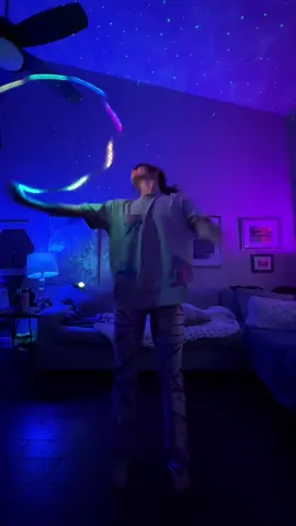 A post by @queerbassqueen on TikTok caption: Bringing back my favorite @AHEE edit for some hoop flow ID: Rezz “Edge” X Aliyah’s Interlude “IT Girl (Ahee Edit) #hoopflow #hooper #flowarts  #hoop #edmtiktok #raver 
