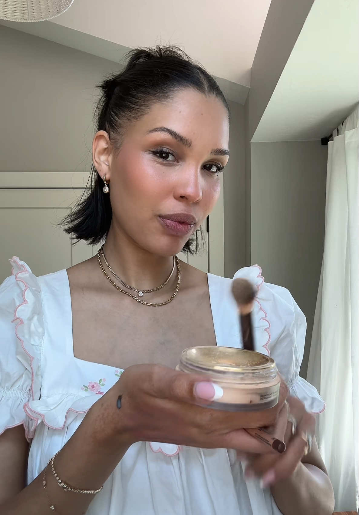 A post by @naraazizasmith on TikTok caption: Sometimes I forget I can speak two languages haha #fypシ #grwm #momtok  