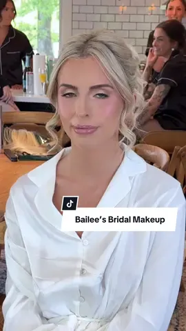 A post by @selenamup on TikTok caption: Bailee’s bridal makeup was a classic glam yet neutral and soft look, this style of makeup looks good on everyone because you are enhancing their features. Making everything pop!  #bridalmakeup #bridalmakeupartist #glam #weddingtok #weddingmakeup