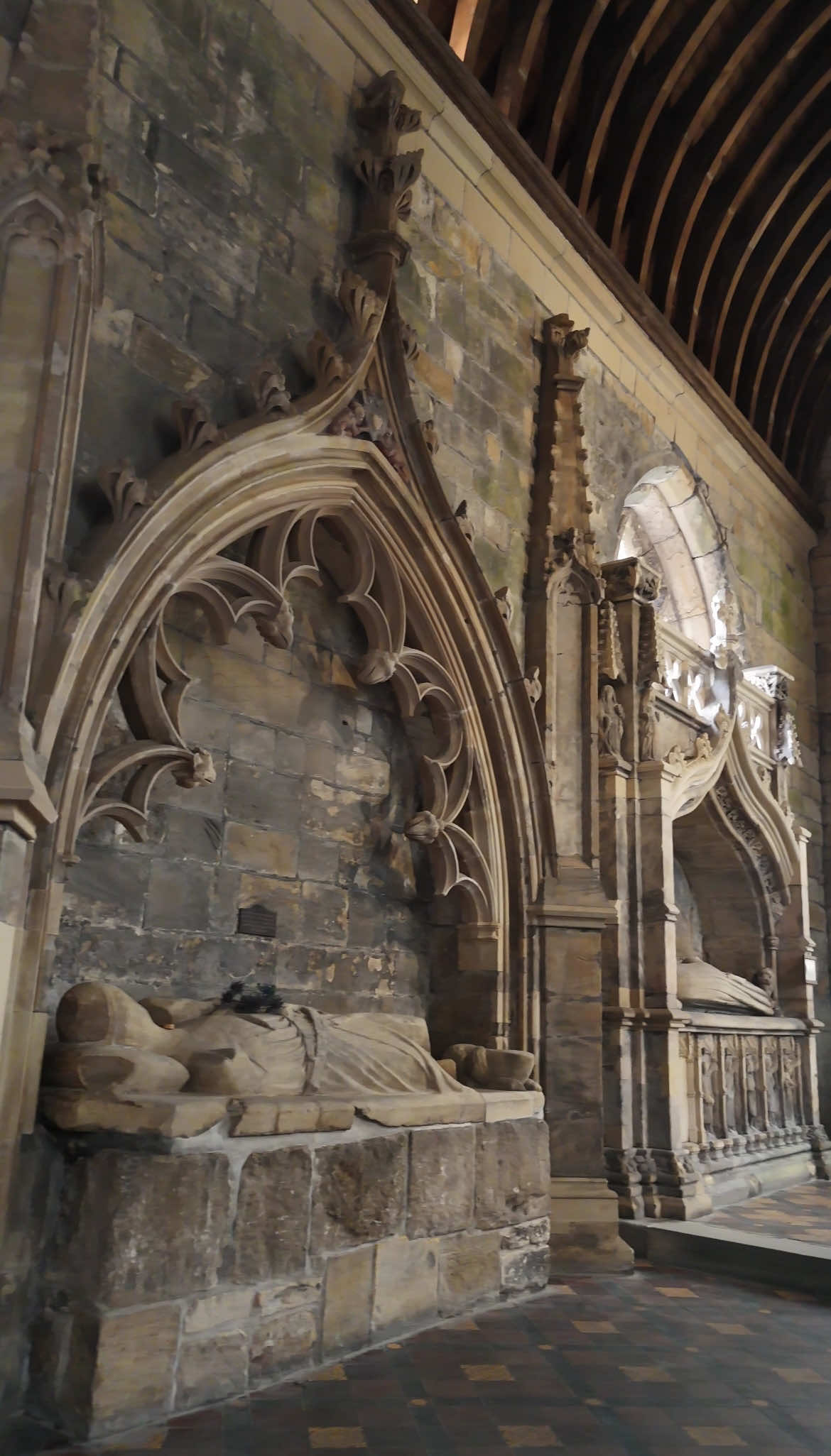 A post by @castlesofscotland on TikTok caption: St Bride’s Church was built in the 1300s as a mausoleum for the Black Douglas family.  ‘The Good Sir’ James of Douglas was close friends with Robert the Bruce, and is said to have slaughtered English troops inside the church in 1307. Thanks to James’s alignment with Bruce, the Black Douglases rose to become one of Scotland’s most powerful noble families of the day. When Sir James died in 1330, his son Archibald ‘The Grim’, 3rd earl of Douglas, modified the church to accommodate his tomb. Sir James’ tomb is the first of three elaborate canopied tombs to be found in the church. Its effigy depicts a knight drawing a sword, with his head on a pillow and his feet resting on an animal. The second tomb belongs to Archibald, 5th earl and 2nd Duke of Touraine, who died in 1439. He’s depicted wearing robes of state and a ducal coronet on his head, and his feet rest on a lion. The tomb chest below has carved figures, probably representing his family. The third tomb is that of James ‘the Gross’, 7th Earl, who died in 1443, and his wife Beatrice Sinclair, who died at some point before 1463. This is a rare double effigy, with the earl in armour and his wife in a flowing robe. Both have their hands clasped in prayer. James II overthrew the Black Douglases in 1455, and St Bride’s soon fell into neglect. A clock tower, containing a clock dated 1565, was added to the nave’s south aisle. The clock is said to have been presented by Mary Queen of Scots. It’s probably the oldest working clock in Scotland. Worship in the chancel continued until 1781, when a new church was built on a different site. Charles, 12th earl of Home, re-roofed and re-glazed the chancel in 1881, to provide a suitable shrine for his mother, Lady Lucy Montagu Douglas. Her tomb now takes centre stage in the chancel. #scotland #church #architecture #beautifuldestinations #history #robertthebruce #bucketlist #hiddengems #travel #braveheart #outlander #hidden #scottishtiktok #scotlandtiktok #churchtiktok #fyp
