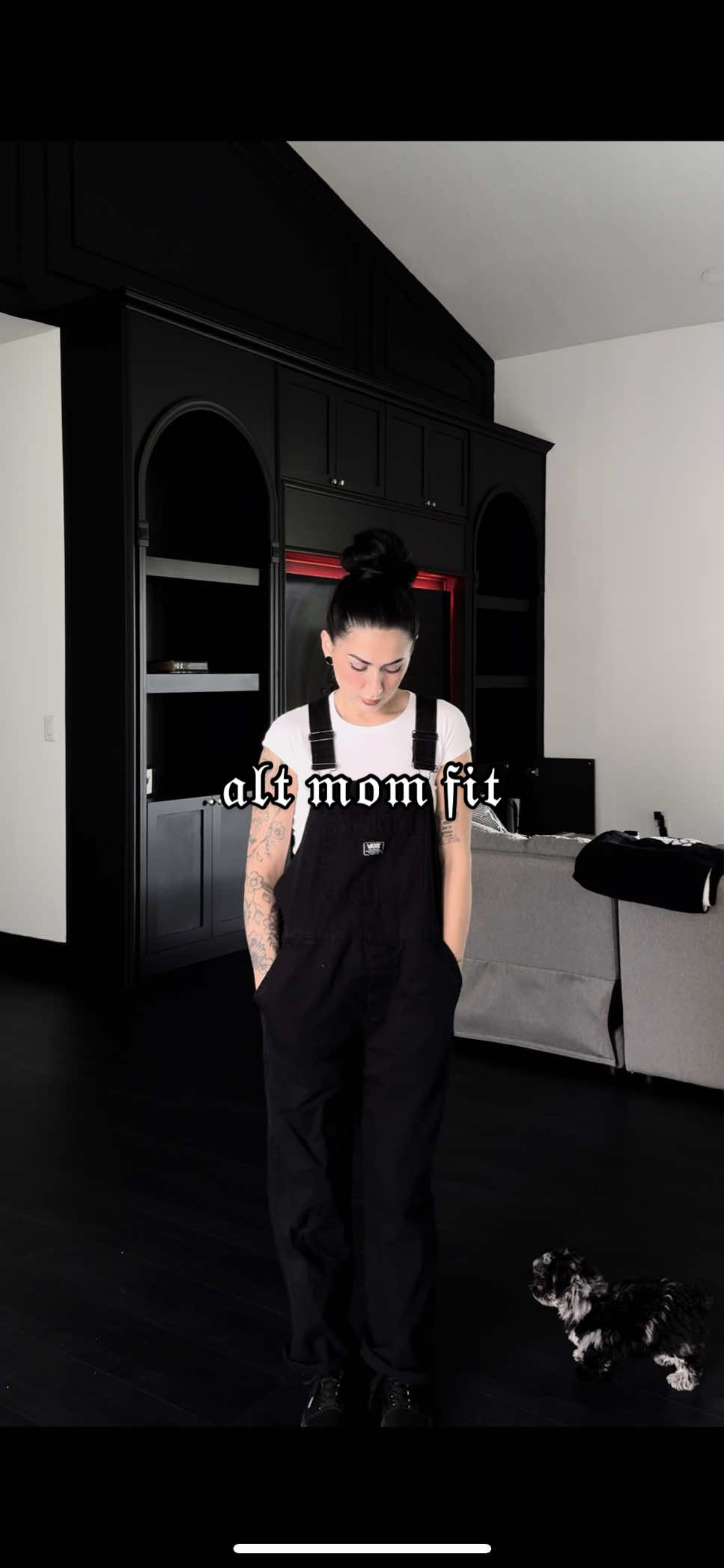 A post by @evdreadful on TikTok caption: you know i’m ready to chase the twins around town when i throw on overalls & bun 🤘🏼🦇🦇 overalls + shoes : @Vans  top : @ZARA  #OOTD #styling #grwm #altgirl #altmom #elderemo #aesthetic #allblack #wuhluhwuh  #homedecor