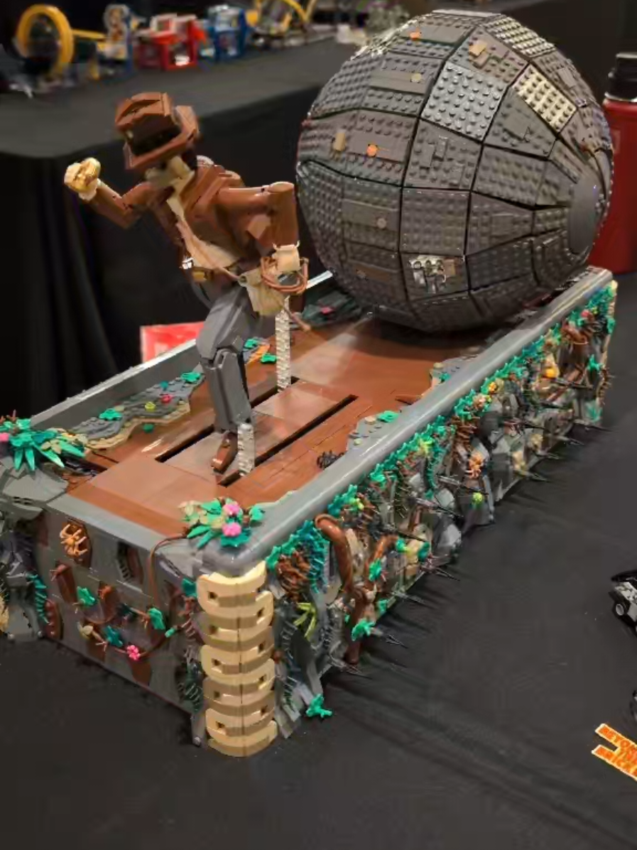 A post by @beyondthebrick on TikTok caption: LEGO Indiana Jones Boulder Scene by Dave Slater #lego #indianajones 