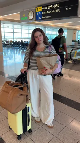 A post by @noelledowning on TikTok caption: Kids though 😂 #family #travel #airport #toddler 