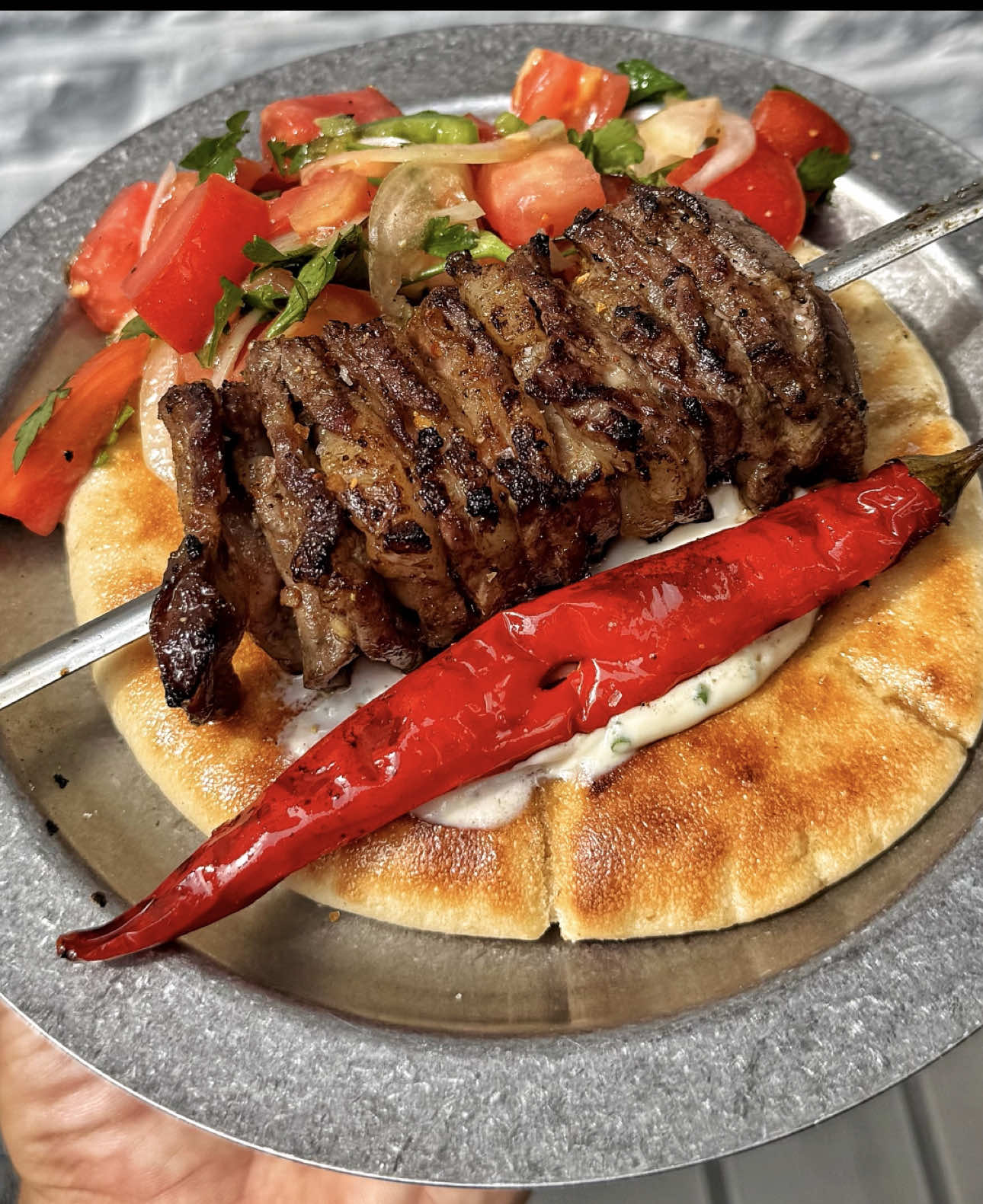 A post by @notorious_foodie on TikTok caption: Grilled Flake Steak - full recipe and long form video now up on Substack, link in bio 🥩🤝🏽 #steak #ribeye #bbq #asmrfood #homemade #FoodTok #cooktok #EasyRecipe #EasyRecipes 