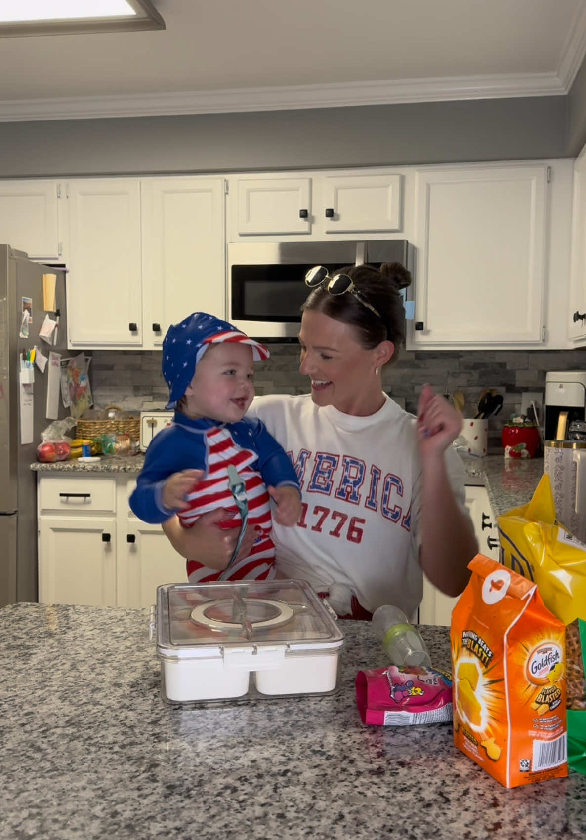 A post by @little_britt15 on TikTok caption: Snackle boxes for the WIN!💙🇺🇸👏🏼