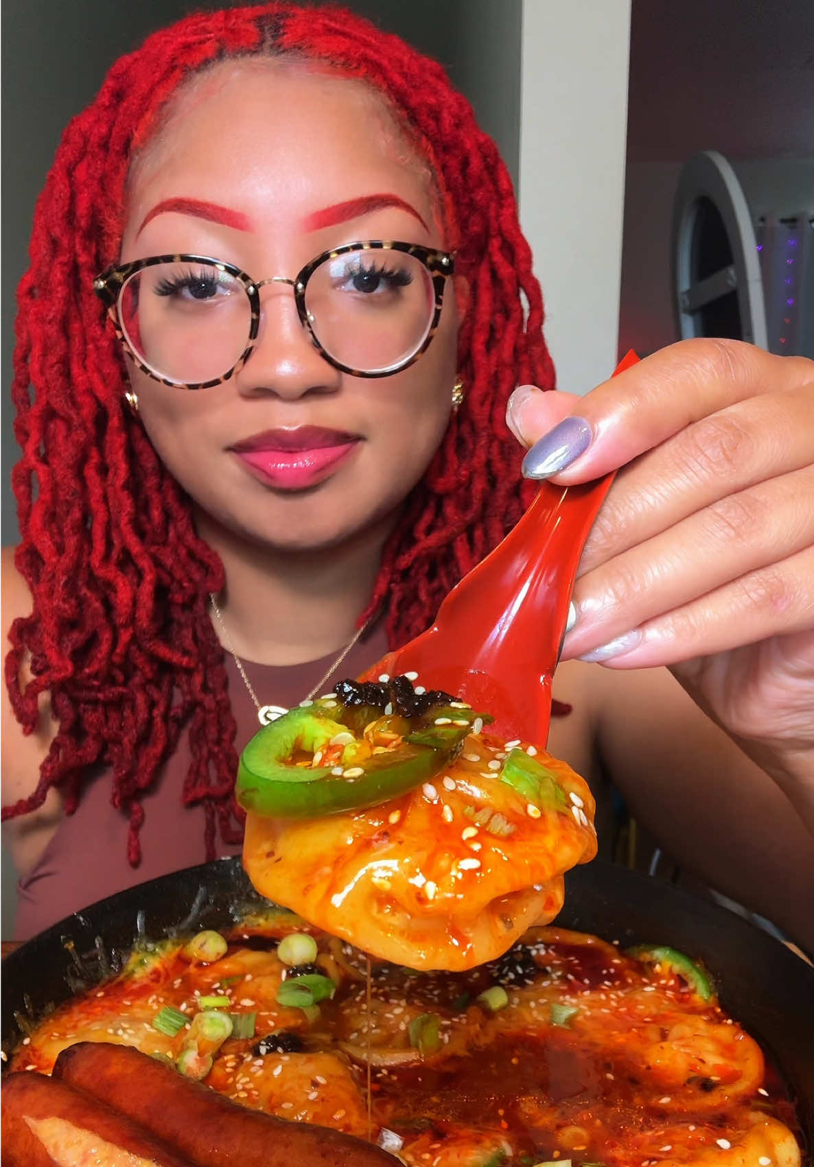 A post by @kie_eats on TikTok caption: Cheesy & Spicy 🌶️ 🥵 Soup Dumplings with Jalapeno Cheddar Sausage #mukbang #soupdumplings #stewtype #buldak soup dumplings mukbangs