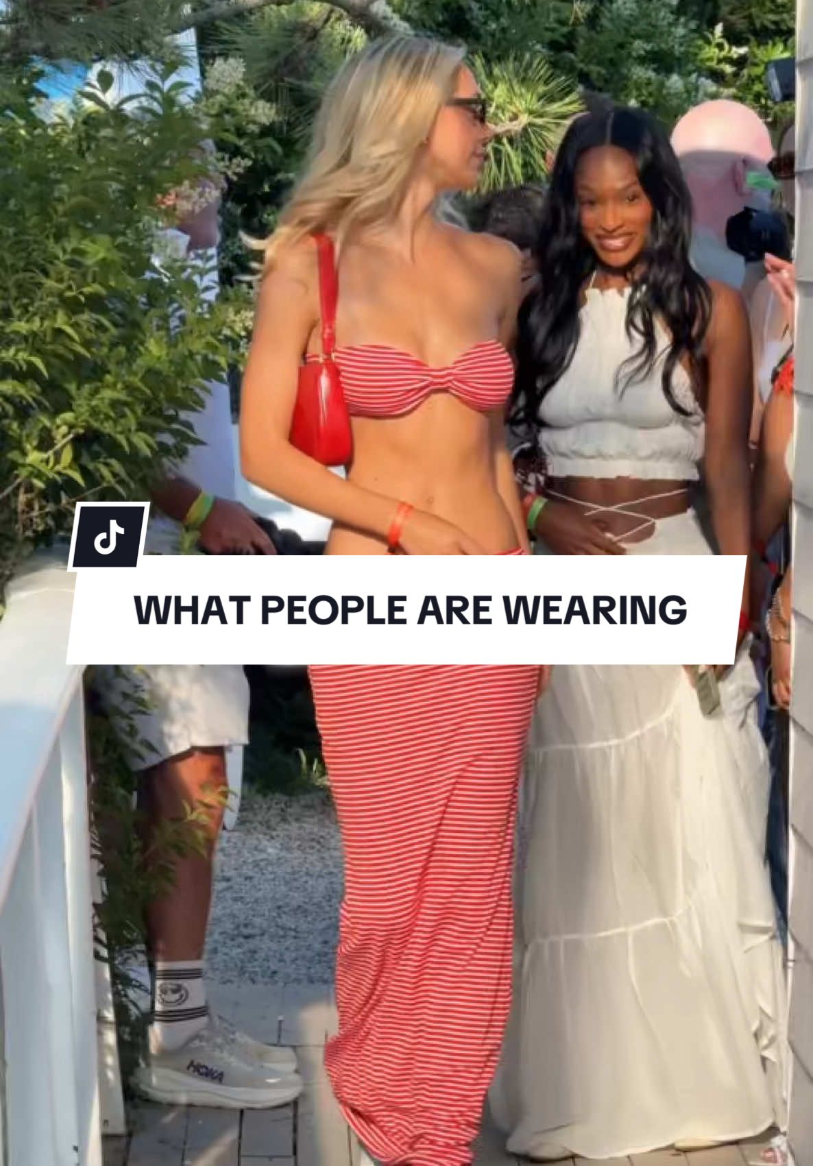 A post by @revolve on TikTok caption: WHAT PEOPLE ARE WEARING · Want to know what your fave influencers were sporting this weekend ❤️🎆OOTD takes you inside the weekend's hottest party for a glimpse at the best of the best 'fits 👀✨ Let us know which looks you're loving & who you spot in the comments 👇 #REVOLVEsummer 🎥 @ootd.com  #revolve #OOTD  #whatpeoplearewearing #outfitinspo #concertoutfit #festivalfashion #foryou #fyp