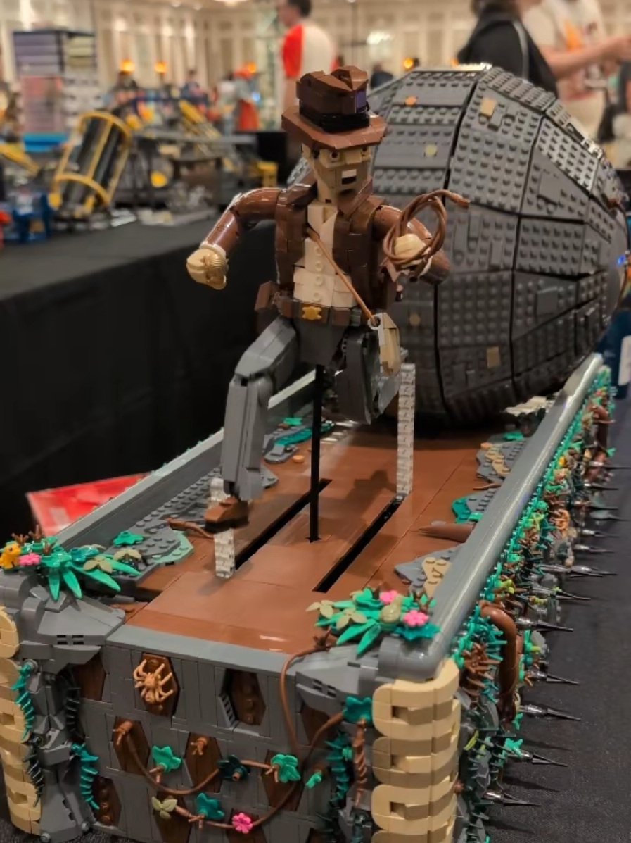 A post by @beyondthebrick on TikTok caption: LEGO Indiana Jones Boulder Scene by Dave Slater #lego #indianajones 