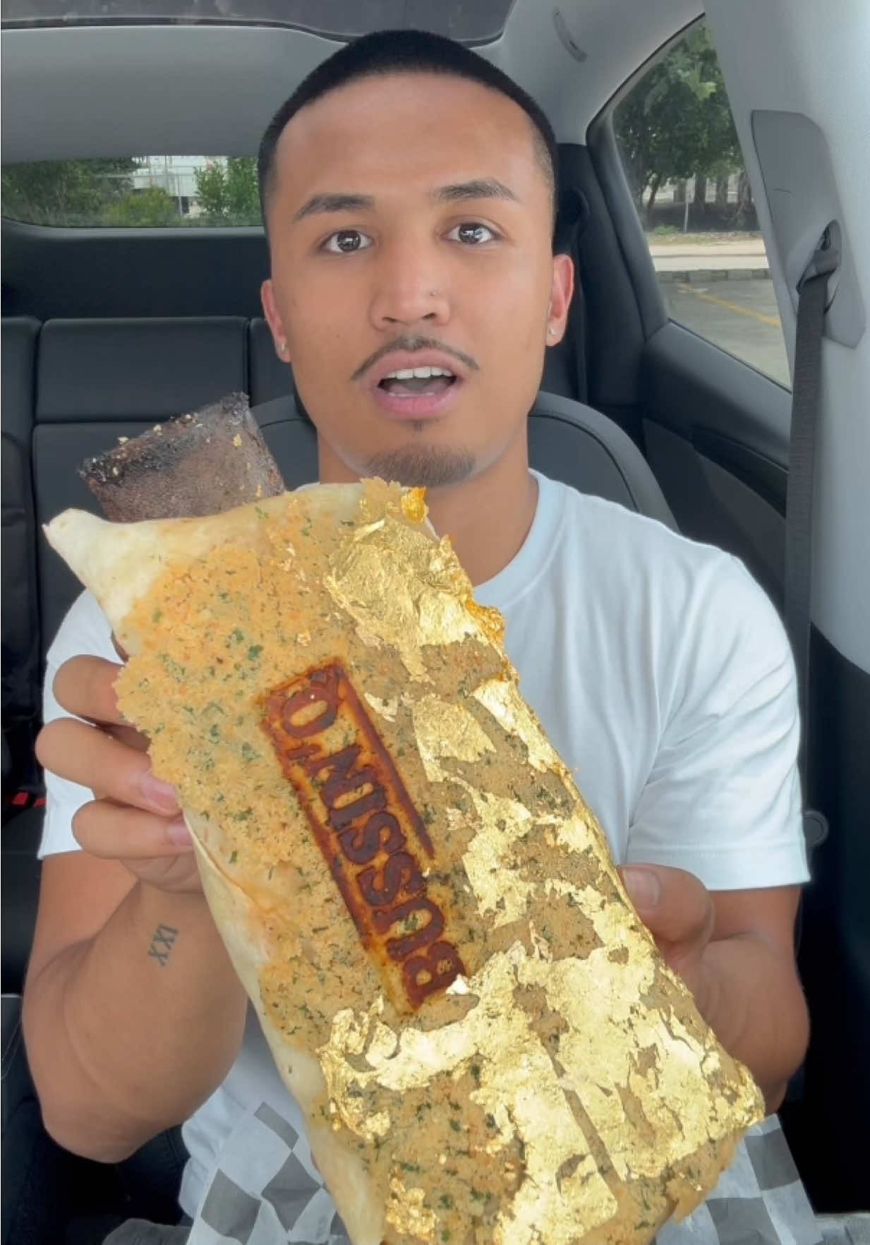 A post by @lifeofcian on TikTok caption: gold beef rib burrito😳 @Bussin’Q bbq #fyp #foodasmr #foodie #fypシ #foodtiktok #mukbang #bbq #review #texas #tastetest 