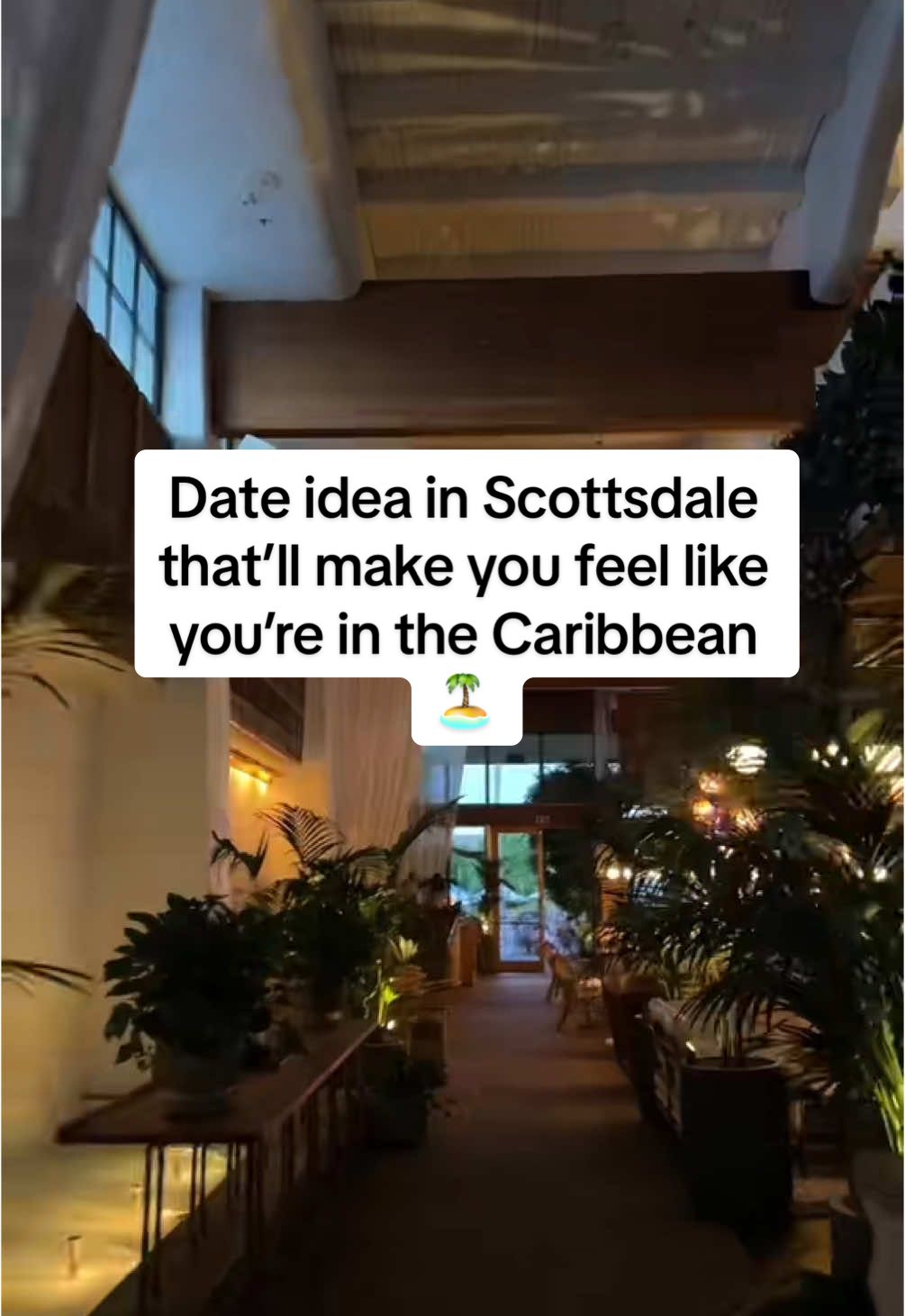 A post by @wildjoyexperiences on TikTok caption: THE LAGOON THO 👀 AZ DATE IDEA ➡️ grab drinks and walk around the hotel lagoon grounds!! the bar is called Canal Club and no reservations necessary…highly recommend pool day pass here! They have a sand beach 😍 #arizona #scottsdalearizona #scottsdale #caribbean #dateideas #bar #dateidea 