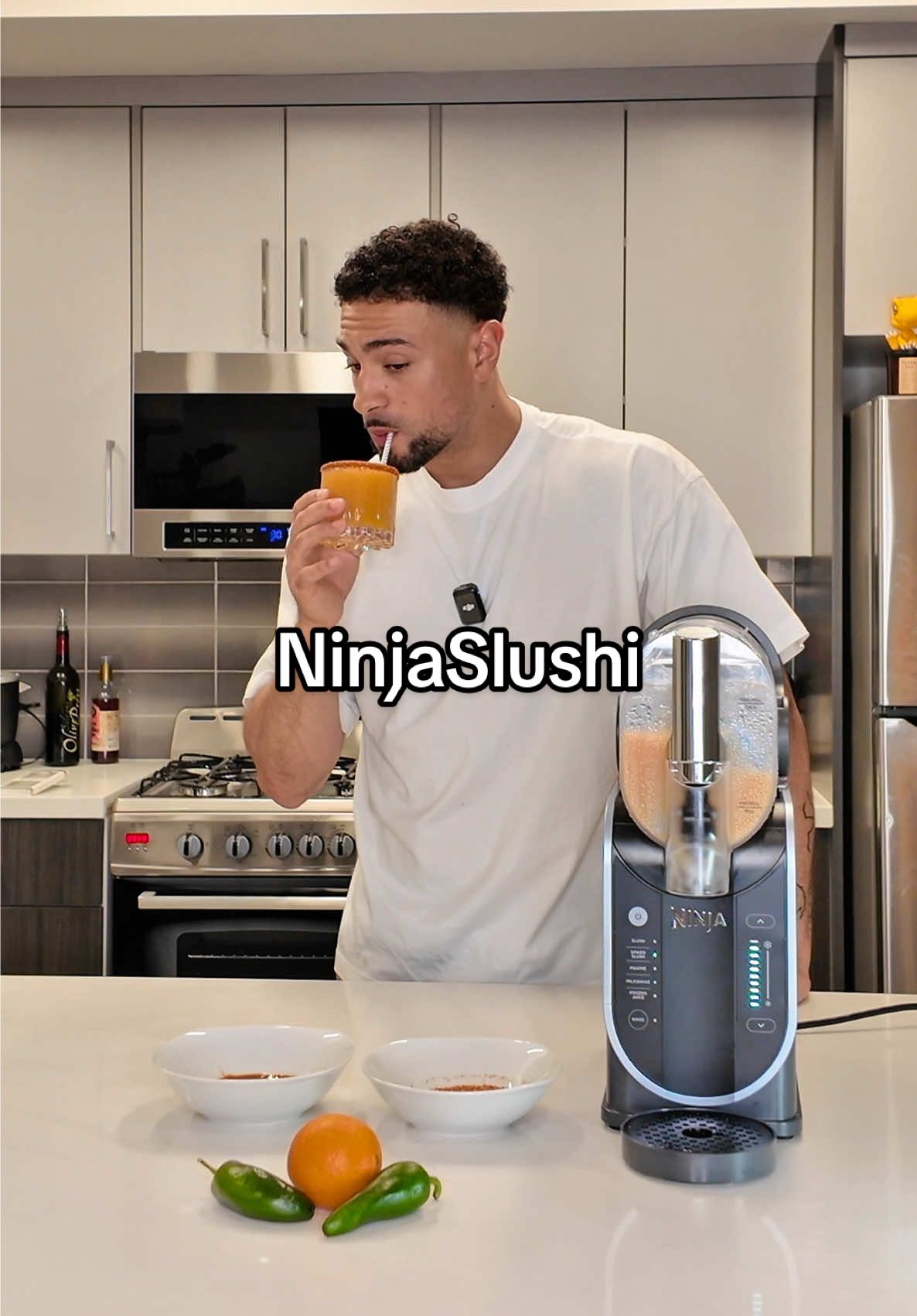 A post by @miguel_harichi on TikTok caption: Summer is here my people and the #NinjaSlushi is here to keep u cool and refreshed all summer long! #NinjaPartner Try out my spicy passion fruit margarita, the drink of the summer made by the best machine to make it @Ninja Kitchen  ——— * 1.5 oz Tequila) * 1 oz Orange Liqueur * 1.5 oz Passion Fruit Puree or Juice * 1 oz Lime Juice * 1/2 oz Simple Syrup or Agave Nectar