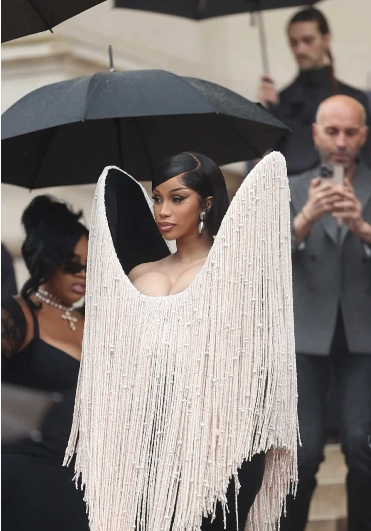 A post by @iamcardib on TikTok caption: Schiaparelli with my little friend Crowdi B 🐦‍⬛ 