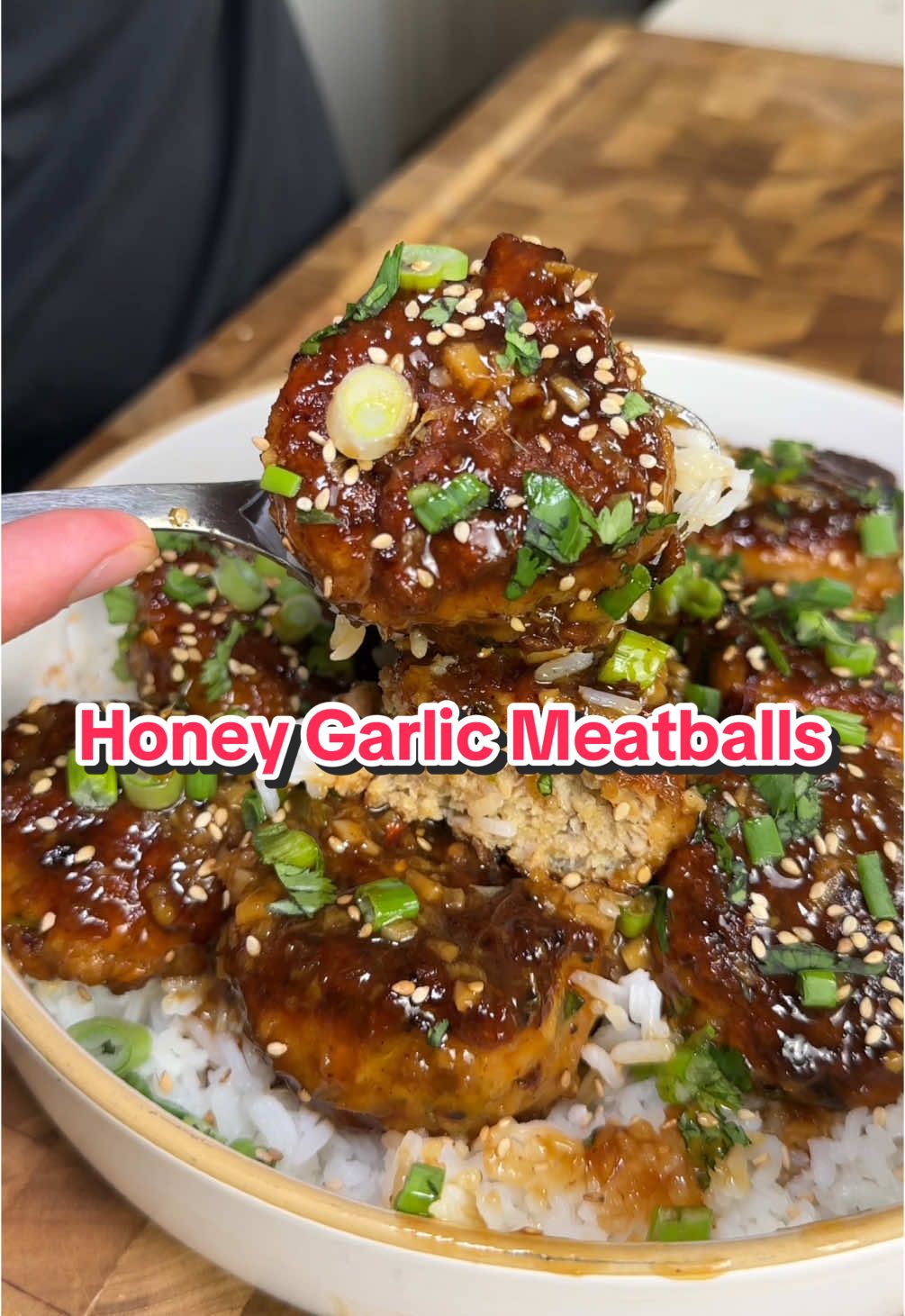 A post by @ice.karimcooks on TikTok caption: High Protein Low Calorie Honey garlic Chicken Meatballs 😍 (recipe 👇🏽) Macros per serving rice not included! (X2): 599 calories |46g P | 30g C | 33g F For the Meatballs: -  1lb ground chicken -  1 egg -  1/4 cup breadcrumbs -  1/4 cup green onions, diced -  2 cloves garlic, minced -  1 tsp freshly grated ginger -  salt and pepper, to taste -  1/2 tsp white pepper -  1 tsp cornstarch -  1/4 tsp red pepper flakes (optional) -  1 tbsp avocado oil to sear meatballs For the Low cal Honey garlic Sauce: -  1 tbsp butter -  4 cloves garlic, minced -  1 tsp freshly grated ginger - 2 tbsp honey  - 1/4 cup soy sauce - 1/4 cup water + 2 tsp cornstarch Serve them over rice with a big squeeze of fresh lime juice, cilantro, green onions, sesame seeds & enjoy! For more tasty high protein recipes just like this comment comment “cookbook” and I’ll send you a special link to purchase my digital cookbooks 🙂‍↔️  Enjoy 😍 . . . . #icekarim #healthyrecipes #easyrecipes #mealprep #quickrecipes 