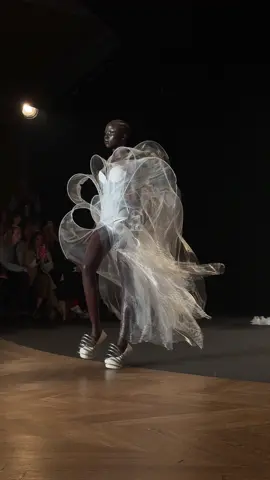 A post by @wisdm8 on TikTok caption: The most beautiful runway I’ve attended. IRIS VAN HERPEN. SYMPOIESIS. 7 July 2025. 