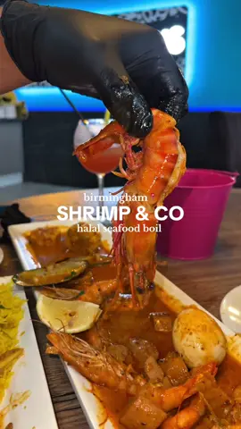 A post by @shezcooks on TikTok caption: Seafood boil in Birmingham 🦞🔥 @Shrimp&Co #seafood #seafoodboil #shrimpandco #birmingham #birminghamfood #starcity #halalfood #restaurant #food 