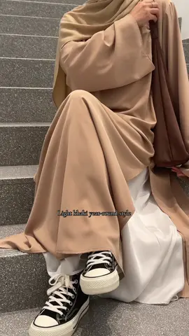 A post by @mariam_collections on TikTok caption: MA063 khaki abaya:warmth in simplicity #luxuryabaya #abayabuth #abayauk #abayafashion #modestyfashion #ootdhijab #abayagirls #mariamscollection #uk #abaya #hijab #london #summerabaya #weddingabaya#kaftanabaya  