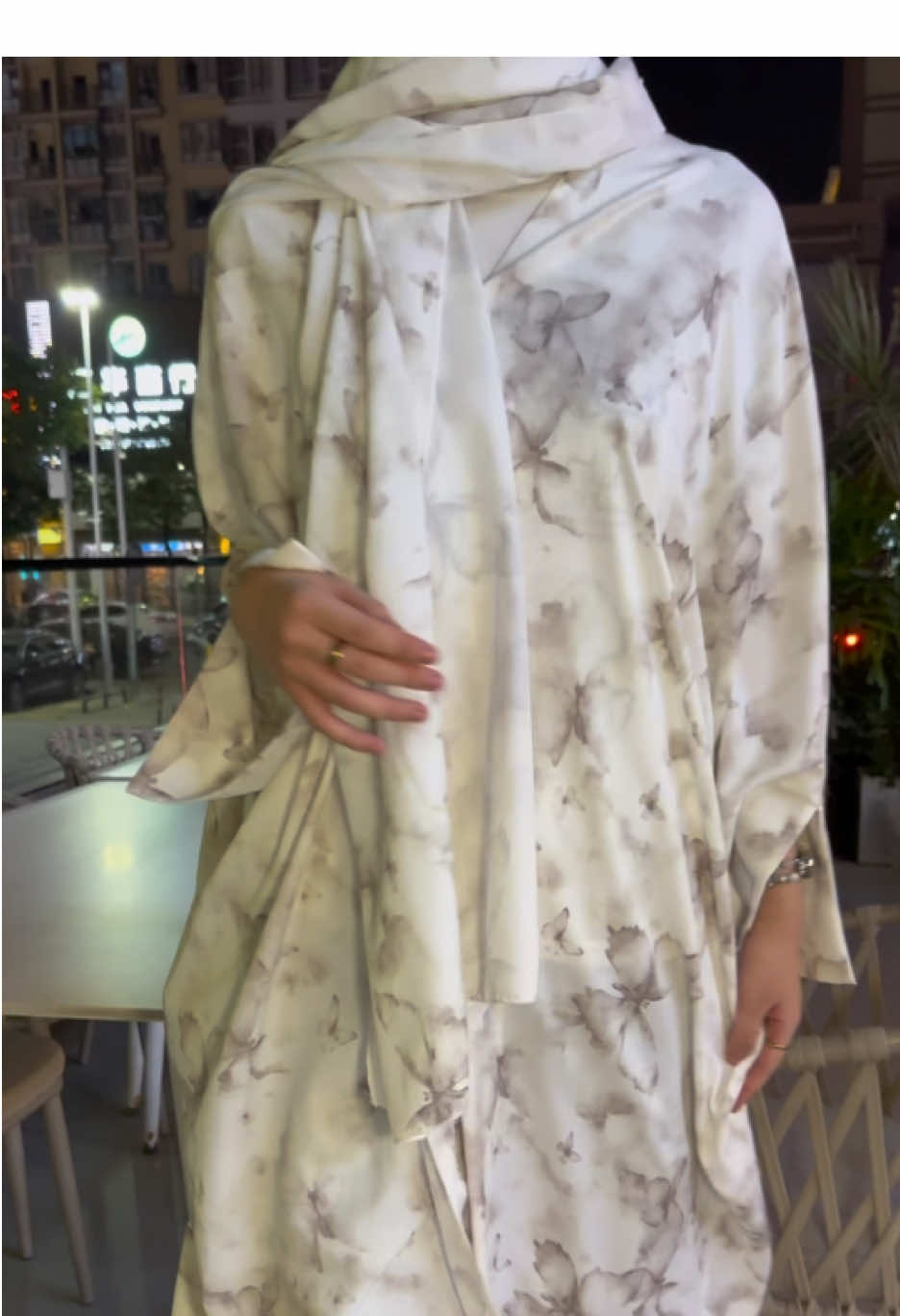 A post by @clfashionuk on TikTok caption: The night cafe and the abaya are more suitable. #sunmer #sunmeroutfit #July #cheongsam #fyp #abayastyle #OOTD#EIDAlAdha#dress #abayagirls #ootdhijab #muslimah #shopping #Hpartydress #outfit #ootdfashion #clothes #fashionblogger #foryou #richgirlabaya#dignified #ModestFashionUK #EidInLondon #HalalFashionRevolution#clfashionnew#Ramadan2026 