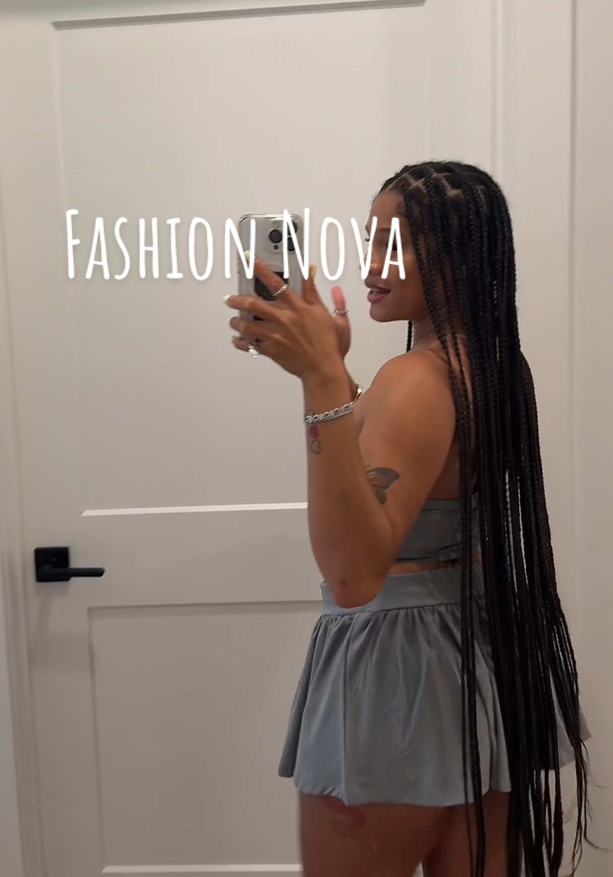 A post by @iammadidenise on TikTok caption: @Fashion Nova 🔎 Lily Ruffle Skirt Set - Heather Grey 🔎 Court Social Seamless Ribbed Sports Bra - Butter Yellow 🔎 Court Social Seamless Ribbed Active Short - Butter Yellow #fashionnova #fashionnovapartner #fashionnovahaul #vacationoutfits #foryoupage 