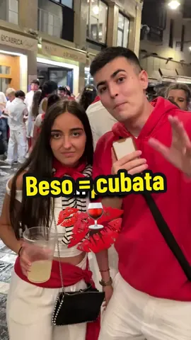 A post by @ on TikTok caption: Si consigues un beso te llevas un cubata 3!!❤️🔥 #parati #viral #sanfermin 