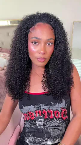 A post by @ on TikTok caption: @Midulla Hair one of my favorite half wigs!! #wiginstall #halfwig #curlywig #wiginfluencer #wiginstalltutorial #midullahair 