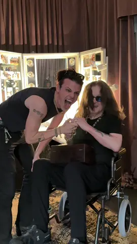 A post by @yungblud on TikTok caption: my hero 🦇