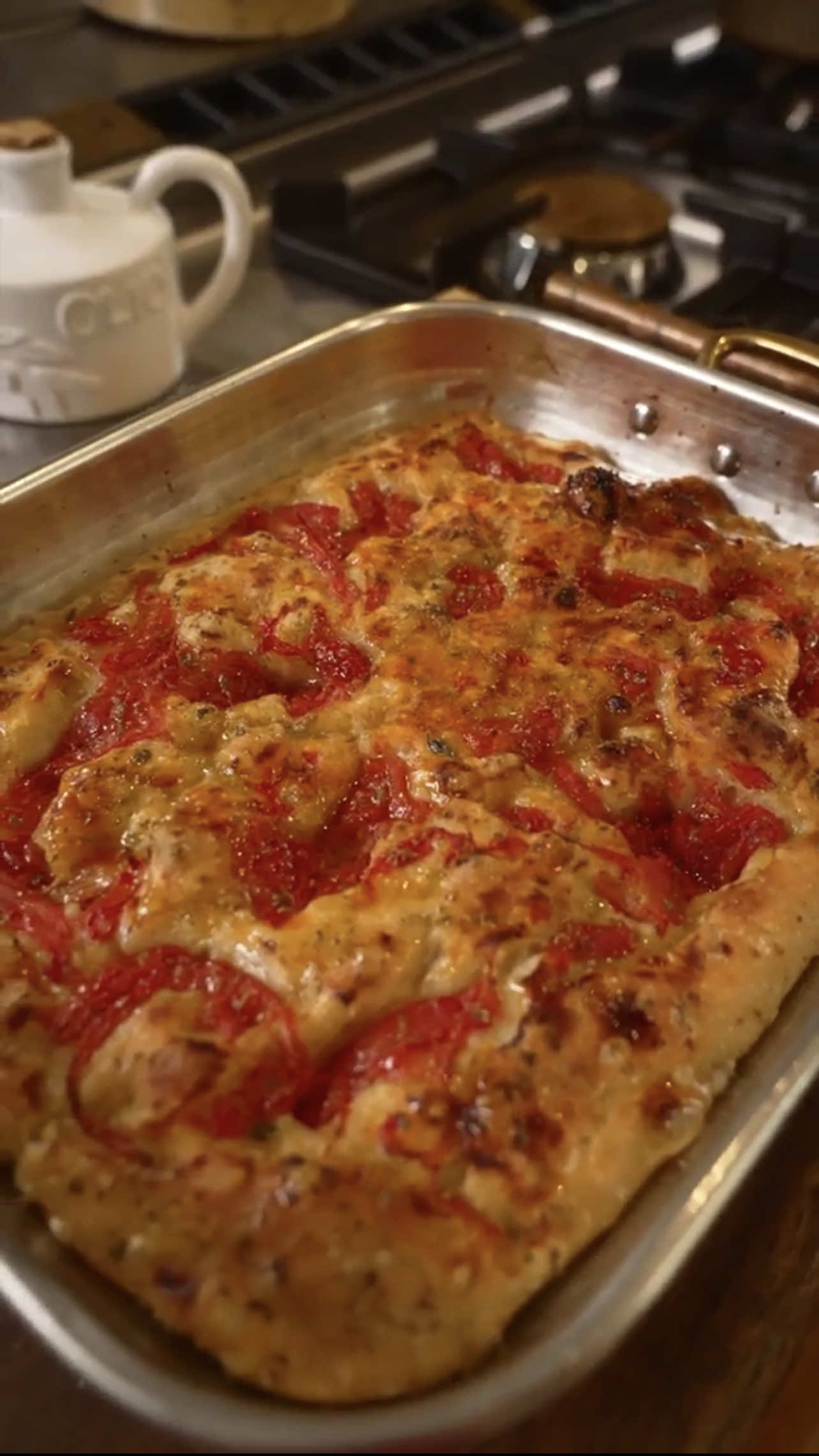 A post by @the_pastaqueen on TikTok caption: So many of you have asked me for Focaccia, and here it is just for you! Join the Royal Court of Pasta to get the written recipe, link in bio ✨