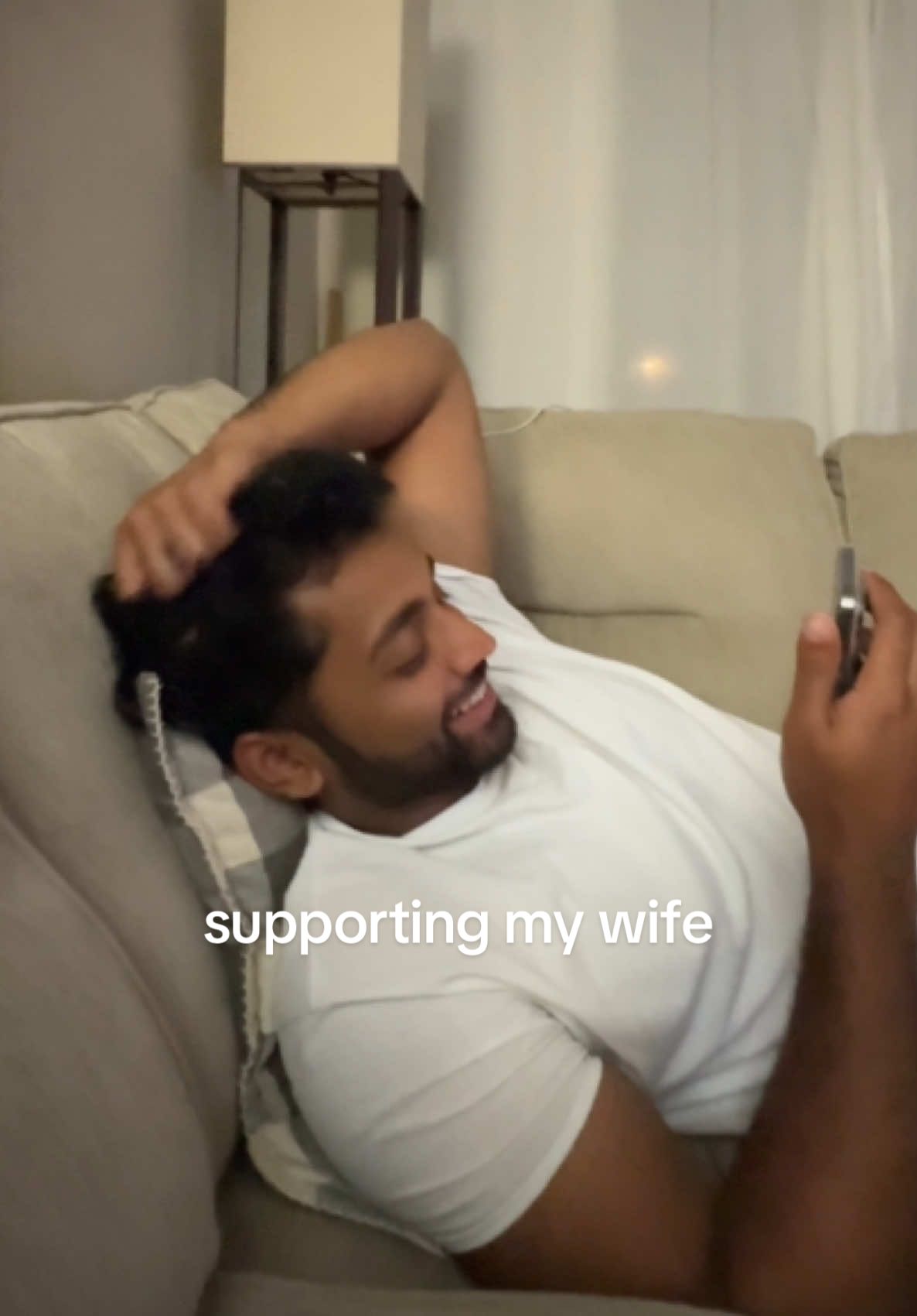 A post by @mattandkharli on TikTok caption: #1 supporter for sure @Kharli Kunarasa  #mattandkharli #couplestiktok #husbandwife #cutecouple #funny 