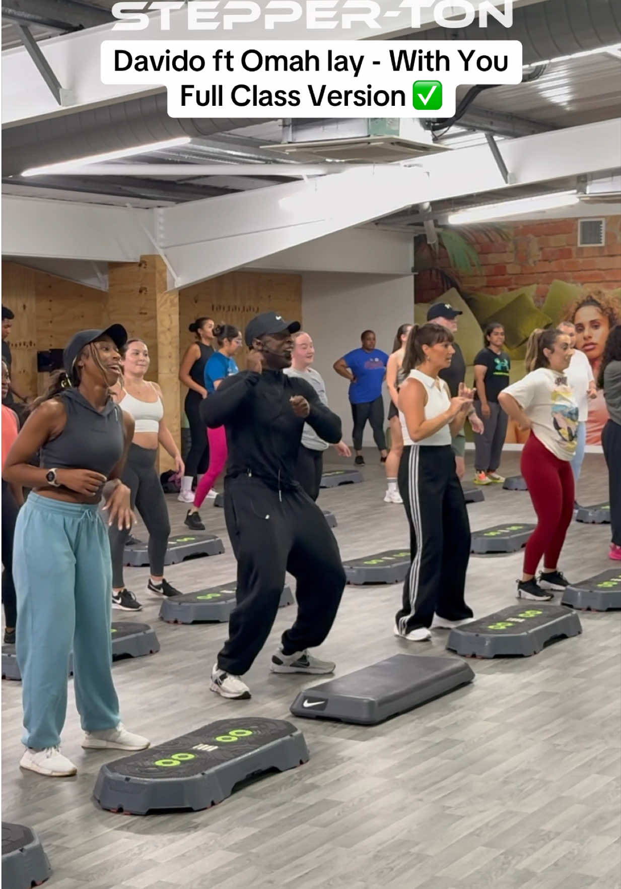 A post by @juliusburphy on TikTok caption: Brought the vibe to the gym 🔥🔥 @davido @Omah Lay #fyp #foryoupage #stepperton #juliusburphy #hiphopstepaerobics #afrostep #funcardio #nike #davido #omahlay #withyou 