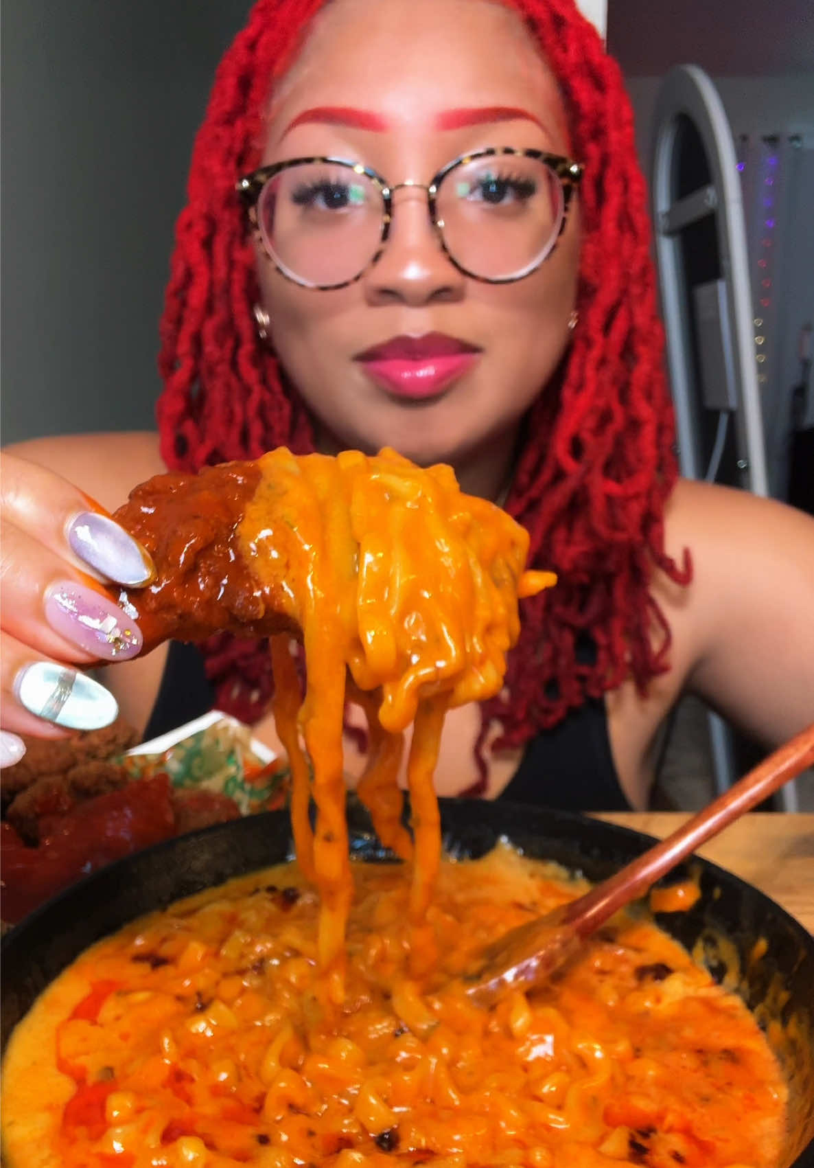 A post by @kie_eats on TikTok caption: Wingstop Tenders and Buldak Ramen Combo #ramen #buldak #mukbang #asmr #fyp #fyp #wingstop #wingstopmukbang #wingstoptenders #buldakramen #creatorsearchinsights