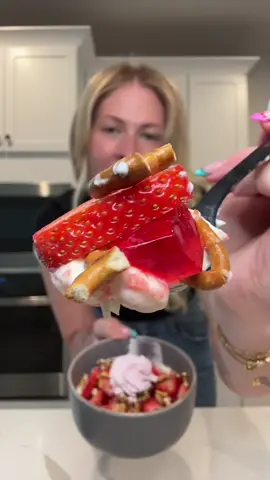 A post by @smallersam_pcos on TikTok caption: Strawberry Pretzel Pie 🥨🍓 but make it low cal + high protein.  (285 cals + 43g protein)  #recipe #easyrecipe #protein #strawberry #pretzels #pie #caloriedeficit #healthy #breakfast #dessert #pcos #hack #mealprep 