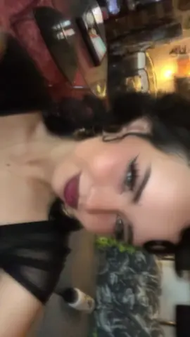 A post by @chiquitaolguita on TikTok caption: late nite draft post 🦇🦇#tattoos #piercings #alternative #BookTok #curlyhair #holywatr 