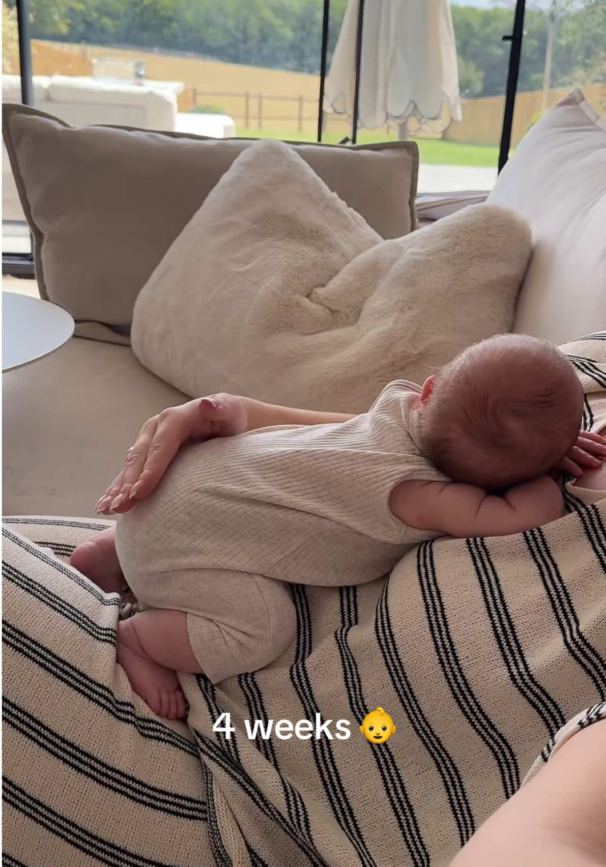 A post by @rooshome on TikTok caption: River is four weeks old today 🥹🤍🧸 #newborn #newbornlife #pregnancy #fullterm #newbornstage #babygirl #bumpprogression 