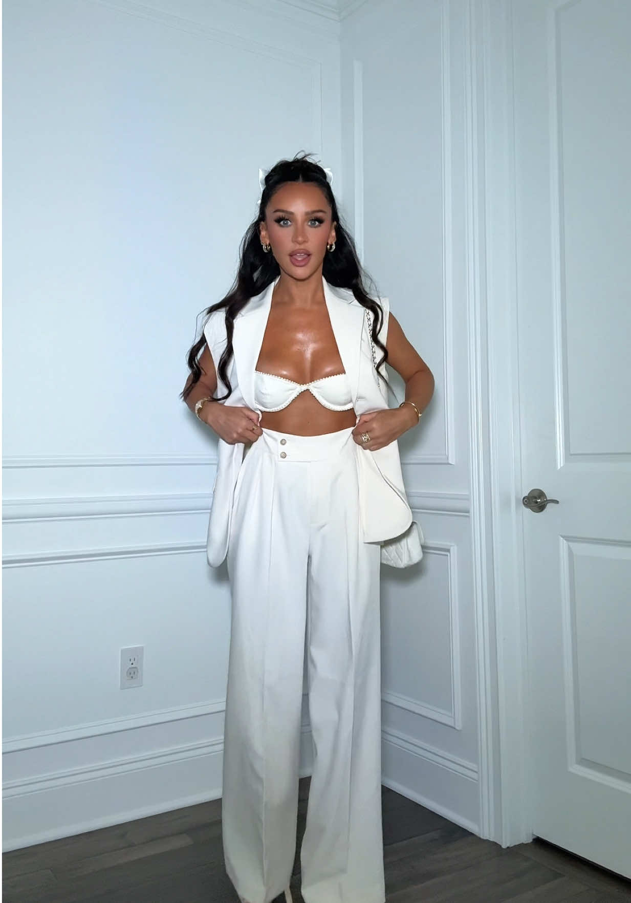 A post by @carlibybel on TikTok caption: My version of Business casual 🕊️🤍 I’ll fix my hair and strap my shoes in the uber that luckily waited for my late ass. One day I’ll be on time 😬 #OOTD 