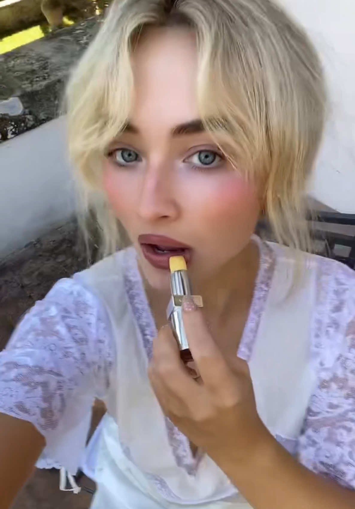 A post by @teamsabrina on TikTok caption: god, she's iconic 💛  #sabrinacarpenter #pradabeauty #manchild 