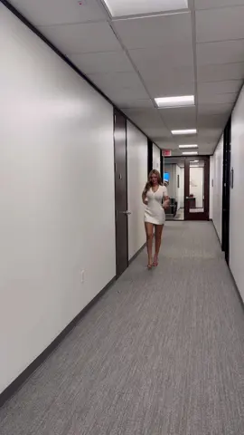 A post by @mariedeesecret on TikTok caption: White dress hallway walkin’ ☺️