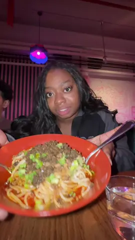 A post by @therealtati on TikTok caption: Trying vegan food for the first time! Would you try this? #tatitriesthings #nyc 