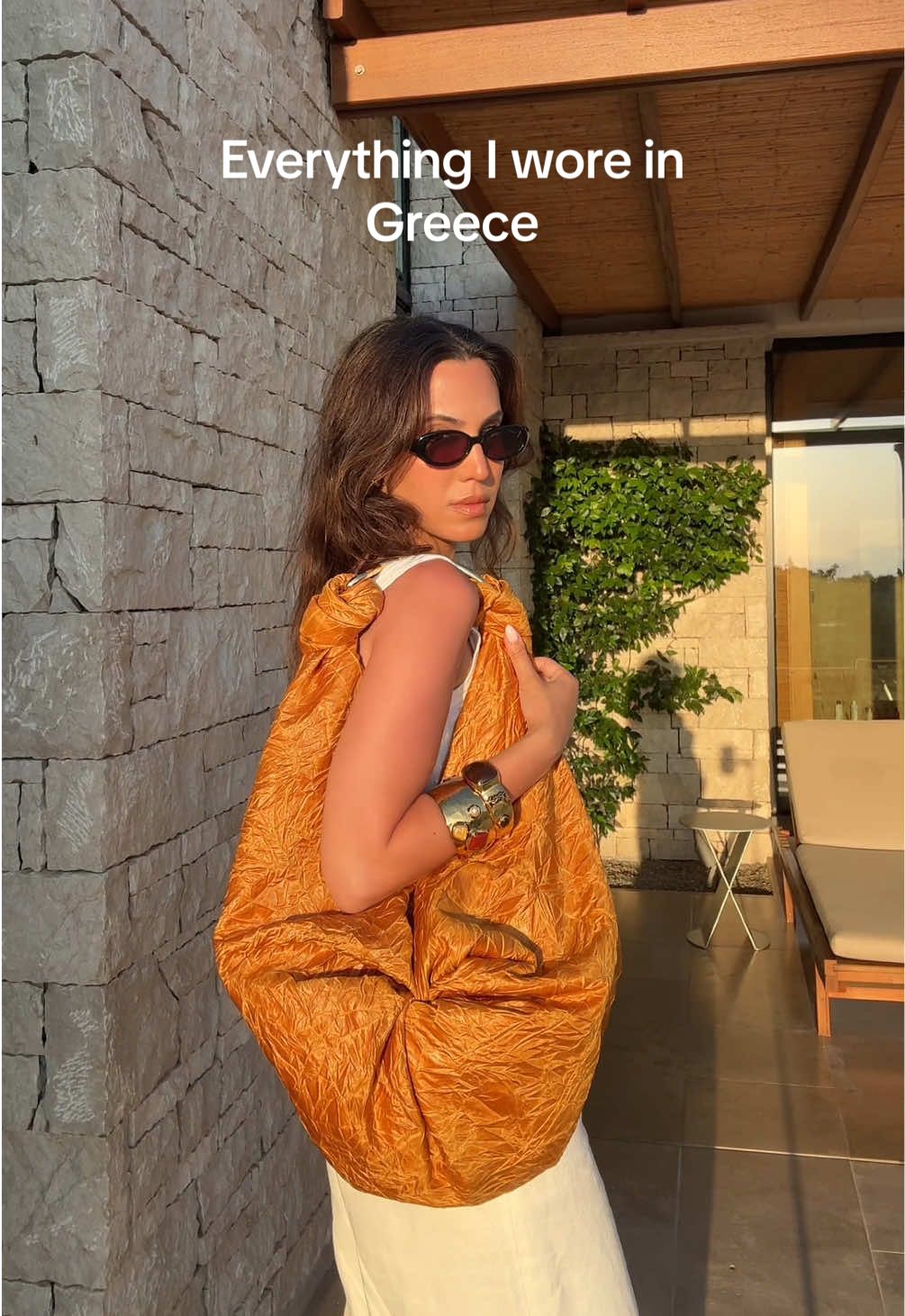 A post by @taniasarin on TikTok caption: Replying to @Stormy Suarez the looks that actually made it out of the suitcase! #summerfashion #vacationlooks #summertrends #outfitideas #luxuryfashion #designerfashion 