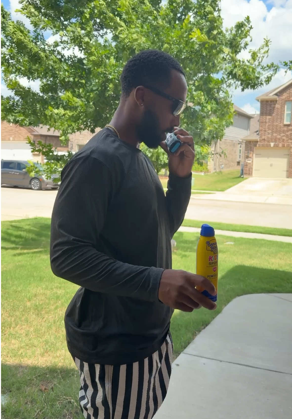 A post by @kyrahenry_ on TikTok caption: My husband being the pool security & making sure our kids are protected with @Banana Boat Kids Sport Spray SPF 50 #bananaboat #protectthefun  #ad 
