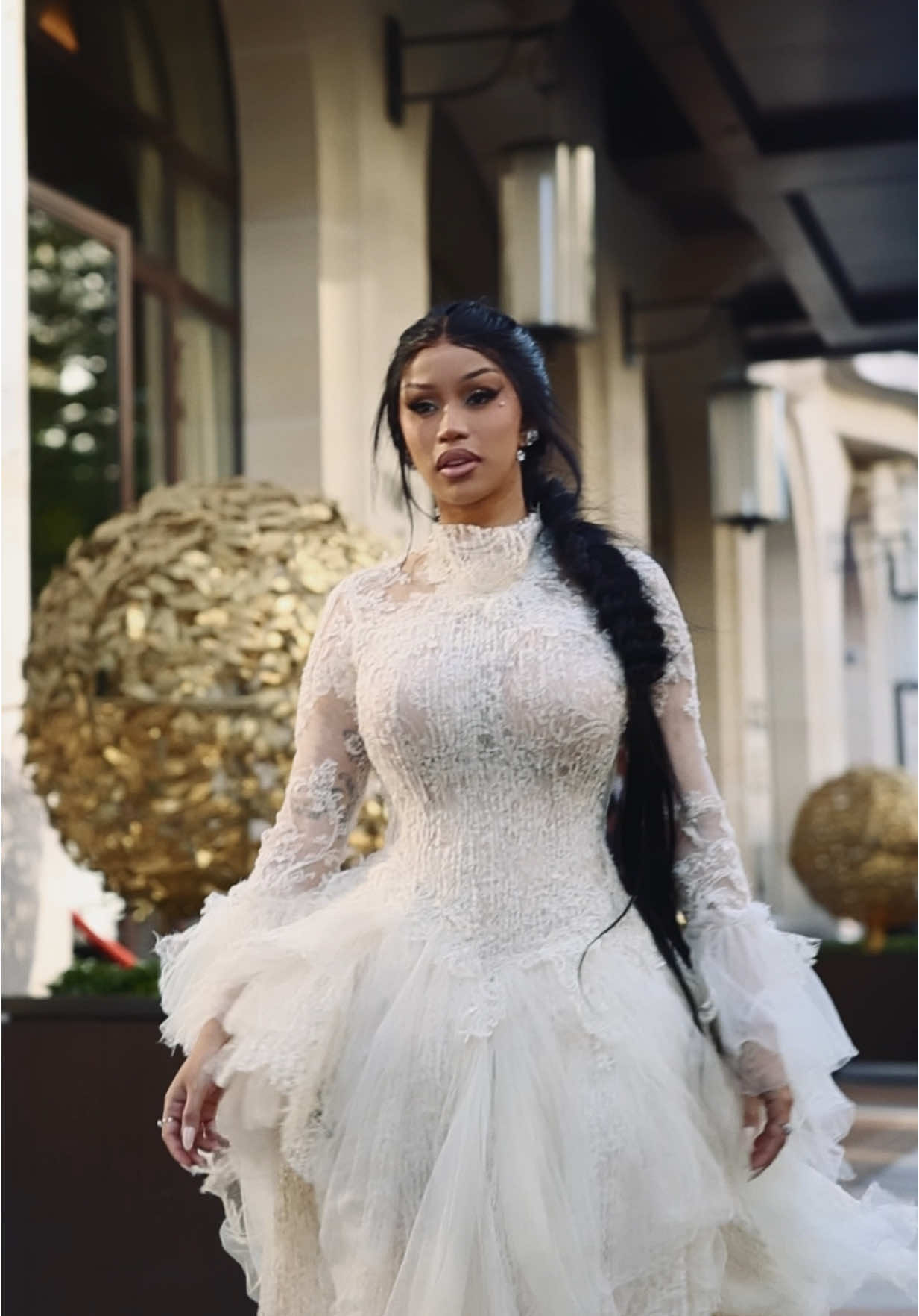 A post by @iamcardib on TikTok caption: A damsel… in this dress 🤍 @ASHI STUDIO 